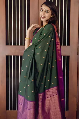 Deep bottle green silk blend saree with magenta border accents