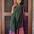 Deep bottle green silk blend saree with magenta border accents