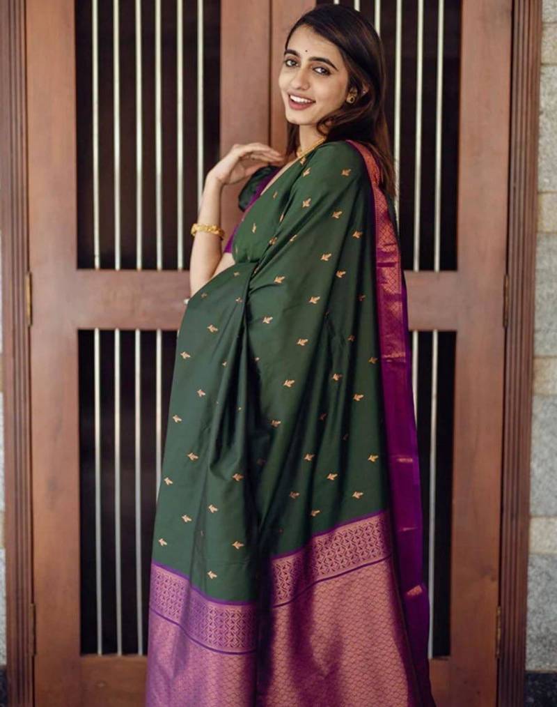 Deep bottle green silk blend saree with magenta border accents