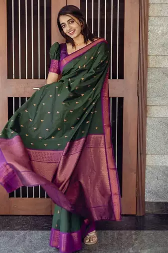Deep bottle green silk blend saree with magenta border accents