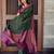 Deep bottle green silk blend saree with magenta border accents