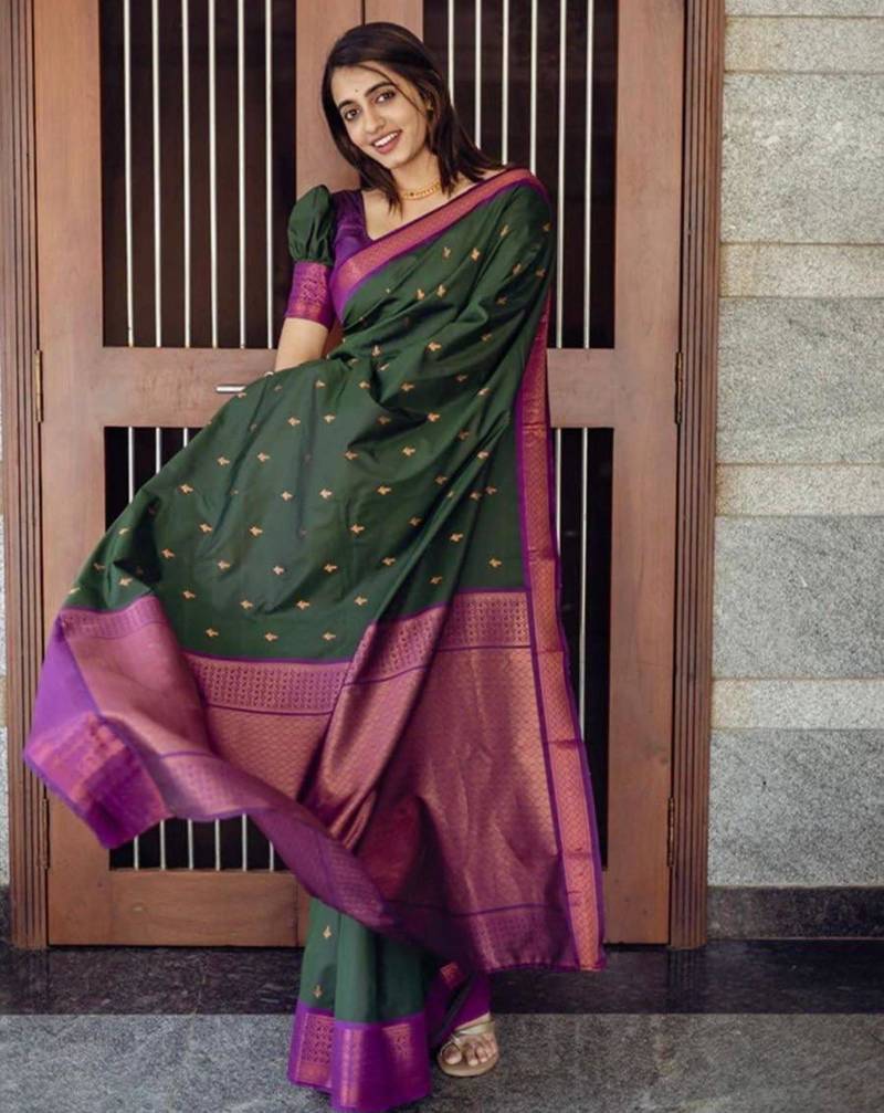 Deep bottle green silk blend saree with magenta border accents