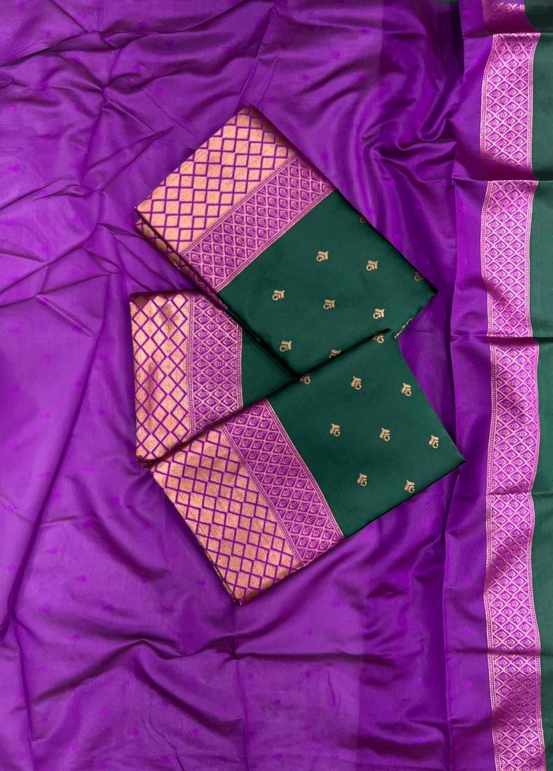 Deep bottle green silk blend saree with magenta border accents
