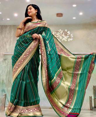 Green striped silk blend saree with ornate maroon border 1