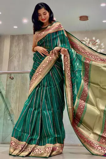 Green striped silk blend saree with ornate maroon border