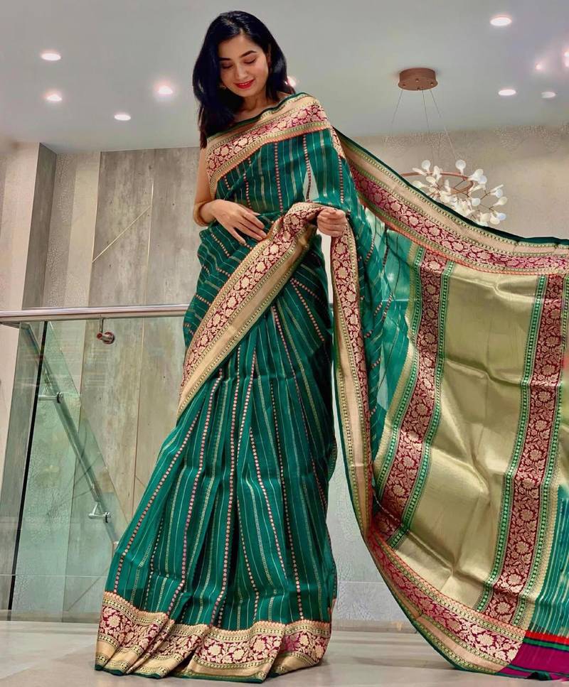Green striped silk blend saree with ornate maroon border