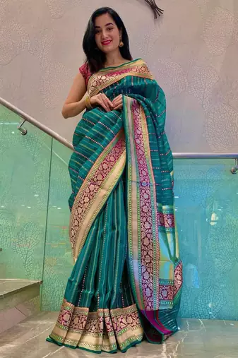 Green striped silk blend saree with ornate maroon border