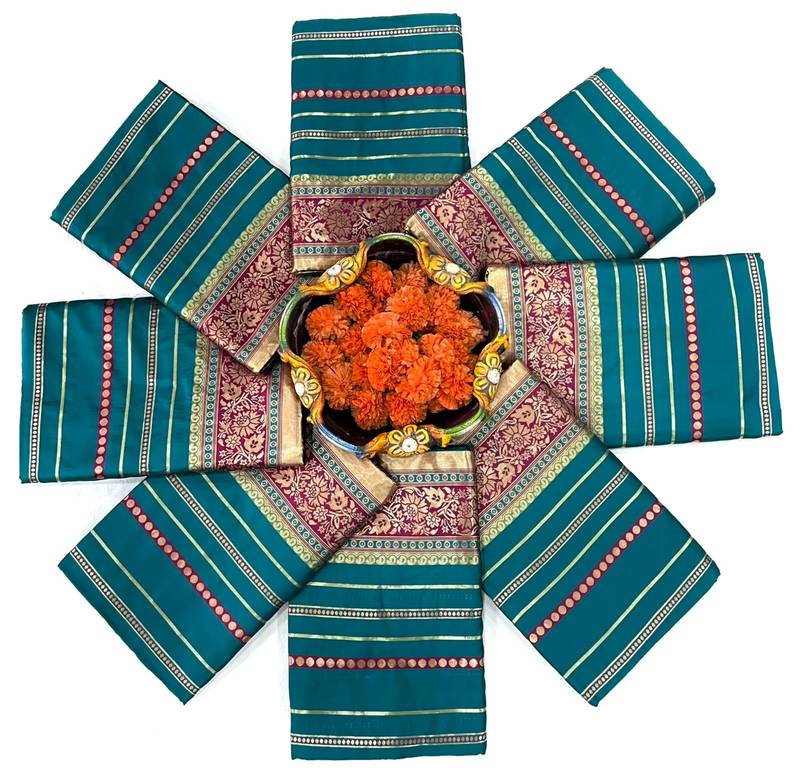 Green striped silk blend saree with ornate maroon border