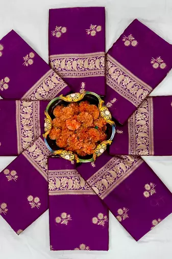 Magenta silk blend saree with classic gold zari border