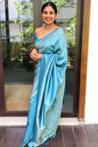 Shimmering cerulean blue silk blend saree with diamond weave