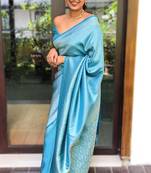 Shimmering cerulean blue silk blend saree with diamond weave