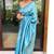 Shimmering cerulean blue silk blend saree with diamond weave