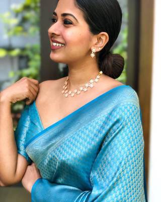 Shimmering cerulean blue silk blend saree with diamond weave 2