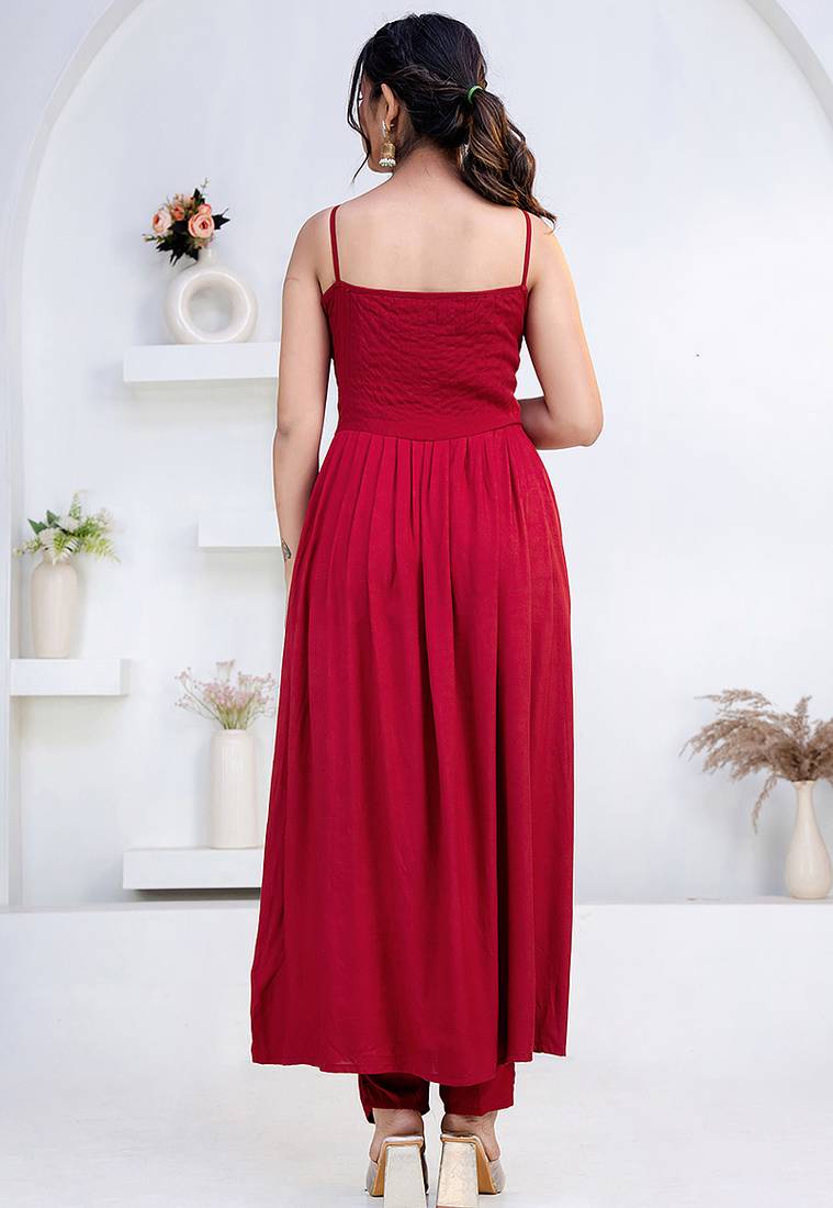 Maroon pintuck solid rayon stitched sleevless flared pant suit set