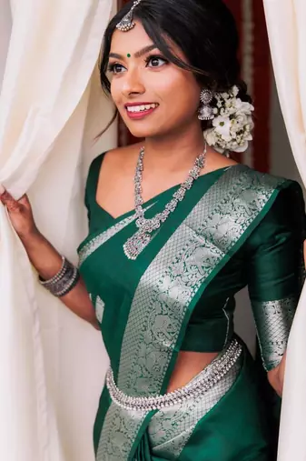 Emerald green silk blend saree with silver zari weave