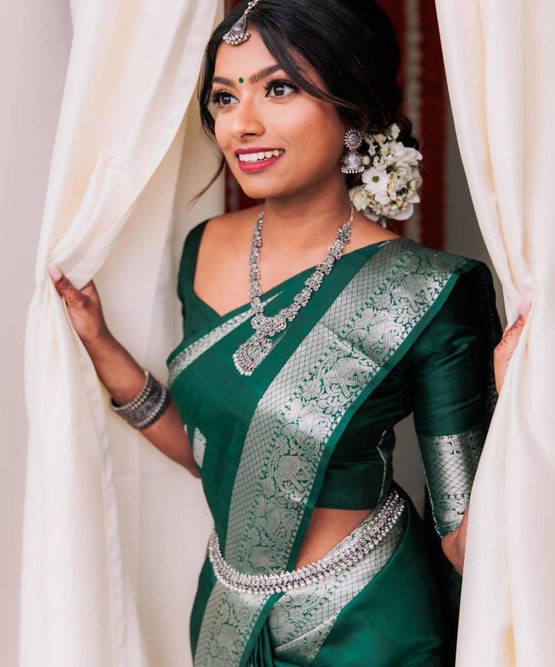 Emerald green silk blend saree with silver zari weave
