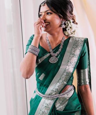 Emerald green silk blend saree with silver zari weave 3