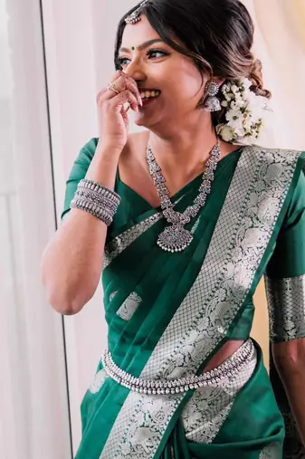 Emerald green silk blend saree with silver zari weave