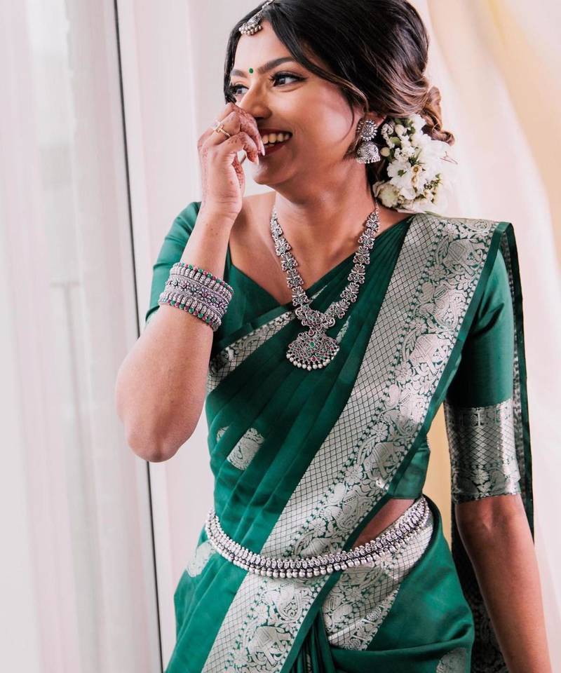 Emerald green silk blend saree with silver zari weave