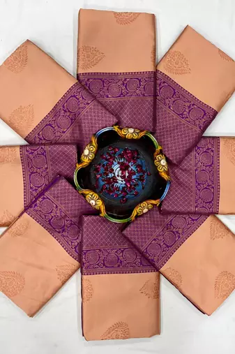Peach and plum purple woven silk blend saree