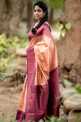 Peach and plum purple woven silk blend saree