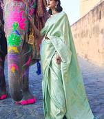 Mint green silk blend saree with gold brocade work