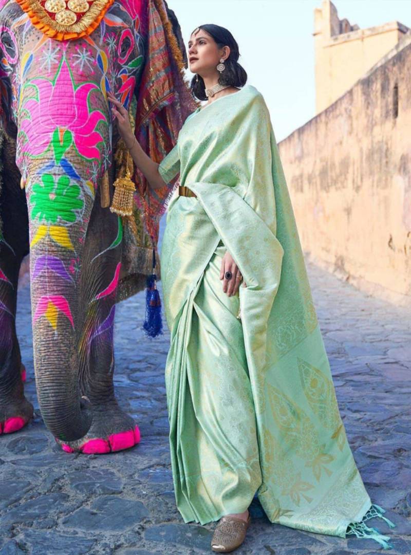 Mint green silk blend saree with gold brocade work