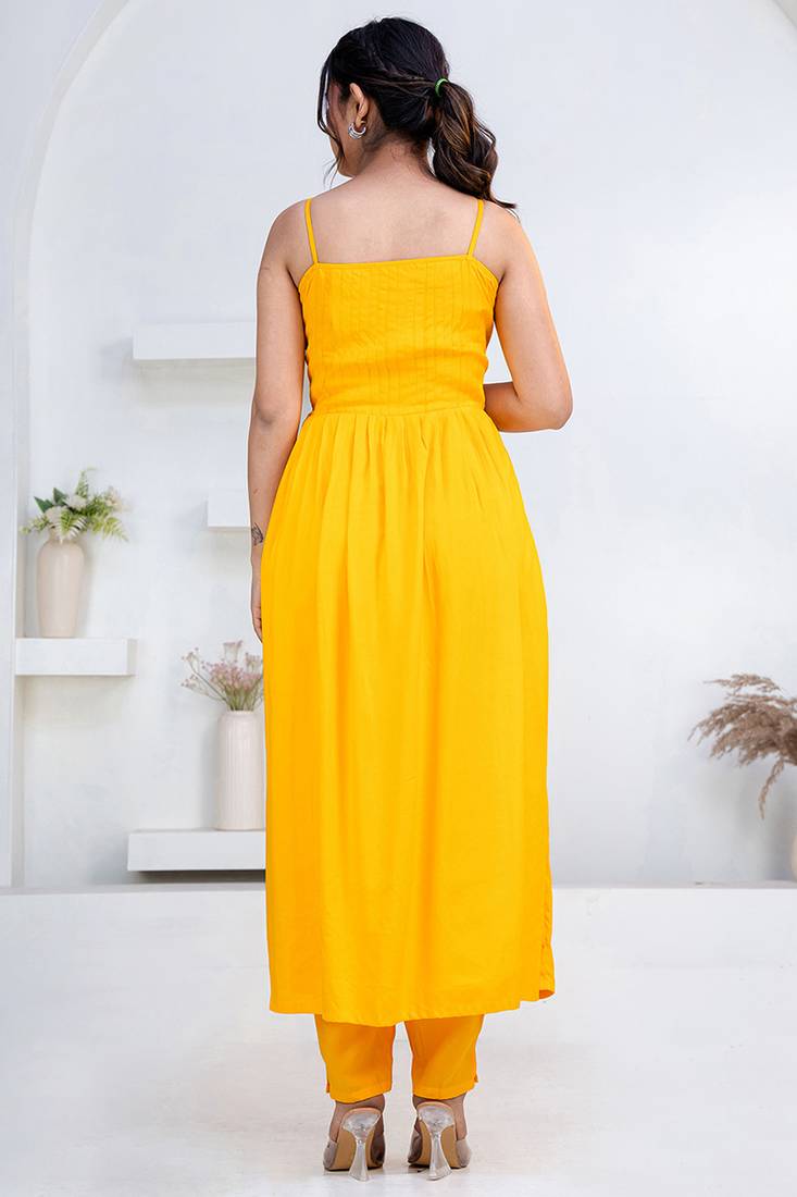Mustard pintuck solid rayon stitched sleevless flared pant suit set