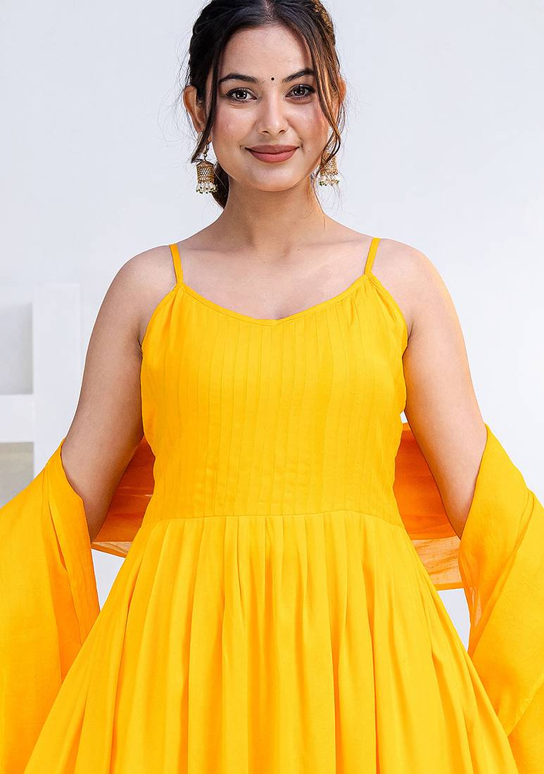 Mustard pintuck solid rayon stitched sleevless flared pant suit set