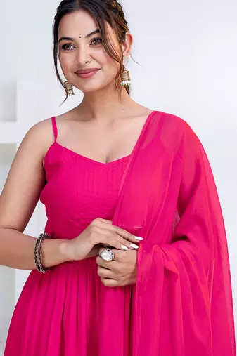 Pink pintuck solid rayon stitched sleevless flared pant suit set