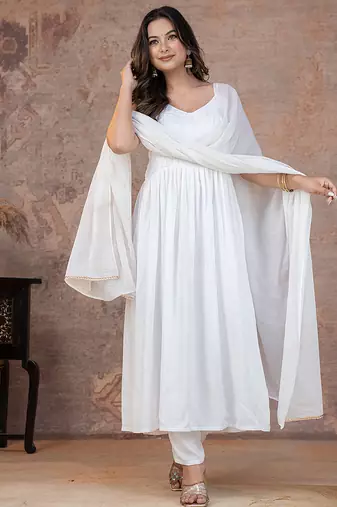 White pintuck solid rayon stitched sleevless flared pant suit set