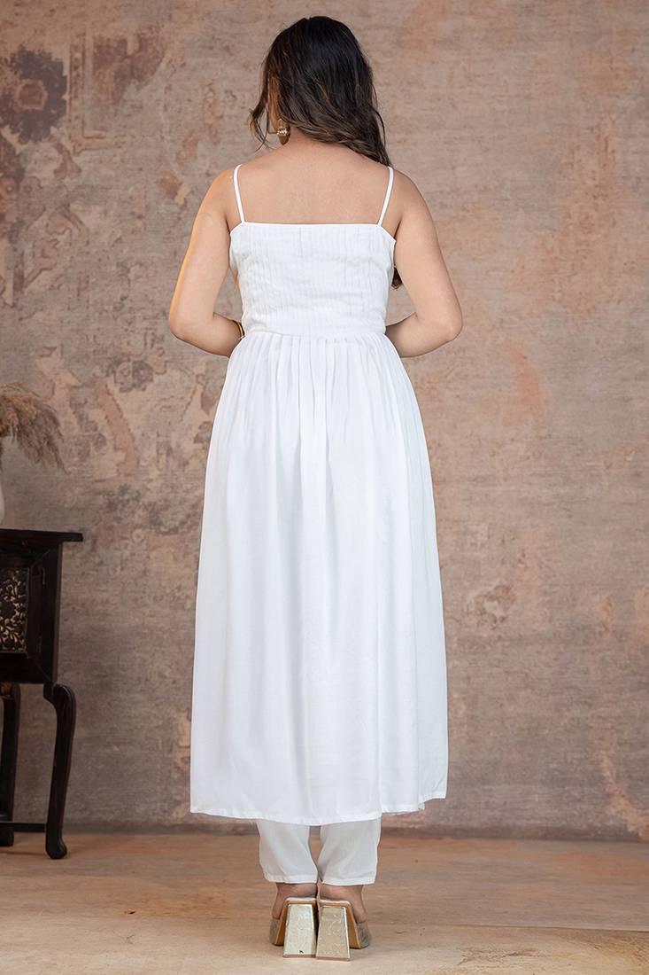 White pintuck solid rayon stitched sleevless flared pant suit set