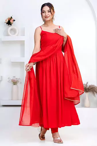 Red pintuck solid rayon stitched sleevless flared pant suit set