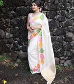 Off-white silk blend saree with colorful leaf motifs