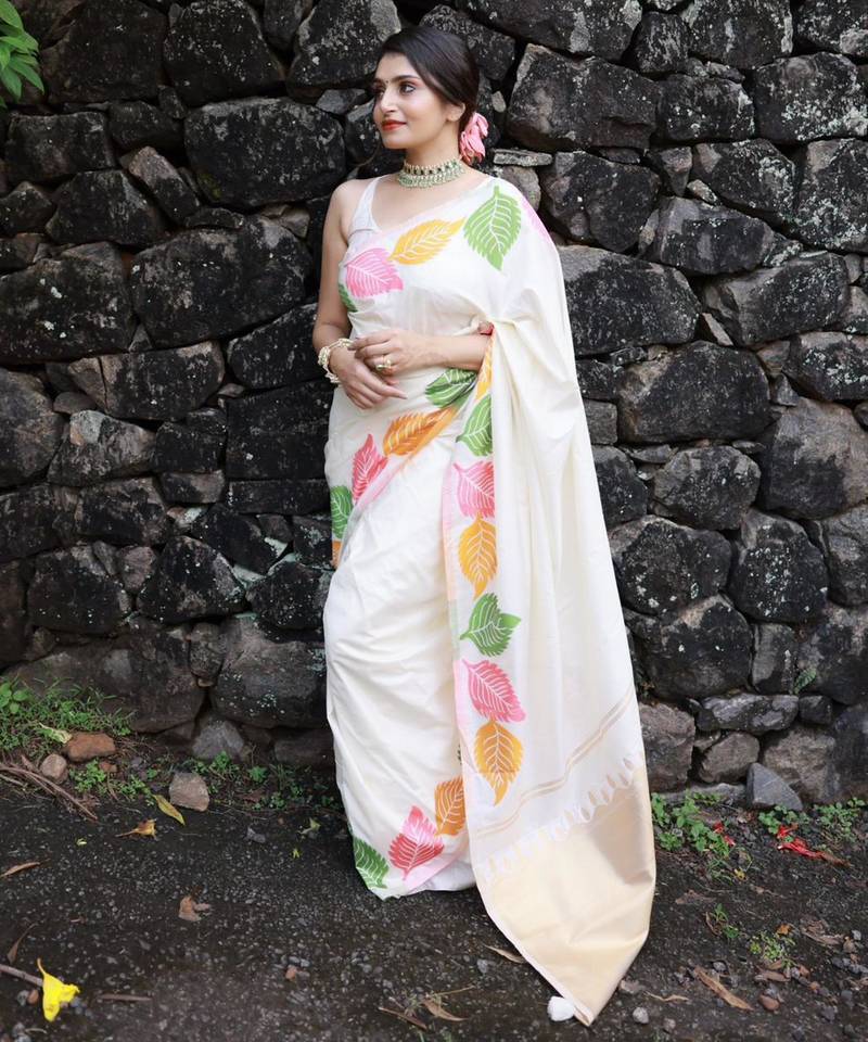 Off-white silk blend saree with colorful leaf motifs