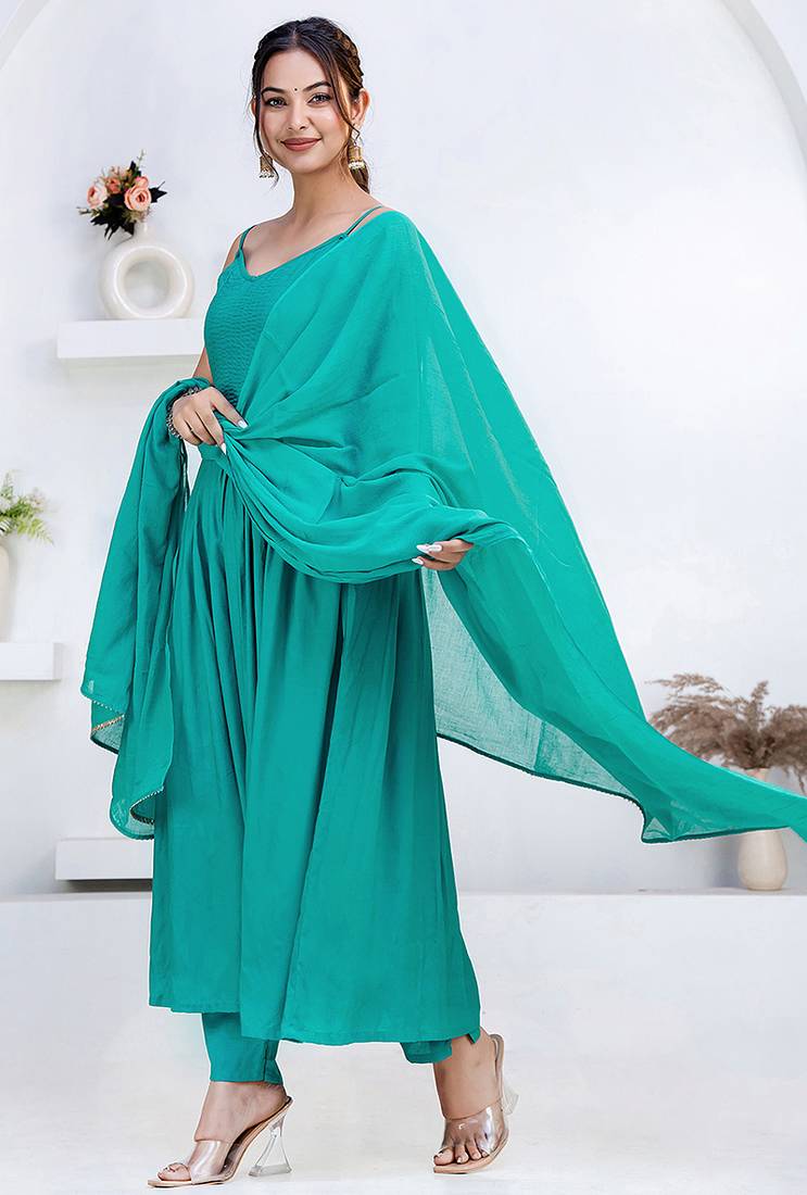 Green pintuck solid rayon stitched sleevless flared pant suit set