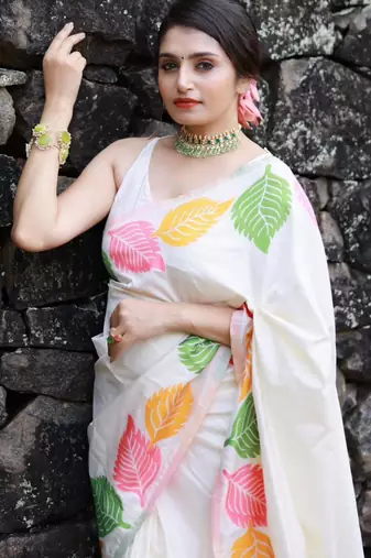 Off-white silk blend saree with colorful leaf motifs