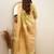 Lime green silk blend saree with golden leaf motifs