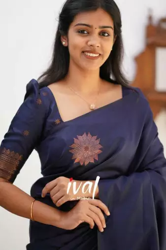 Navy blue silk blend saree with copper starburst motifs