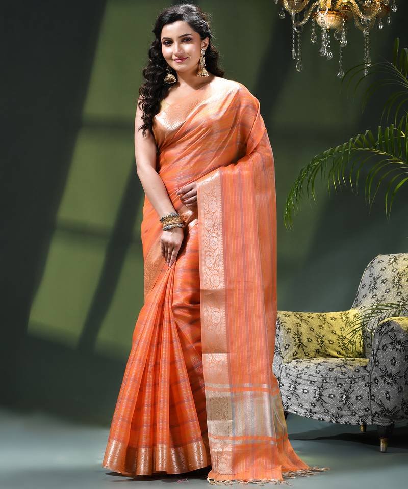 Tissue silk stripped orange festive saree