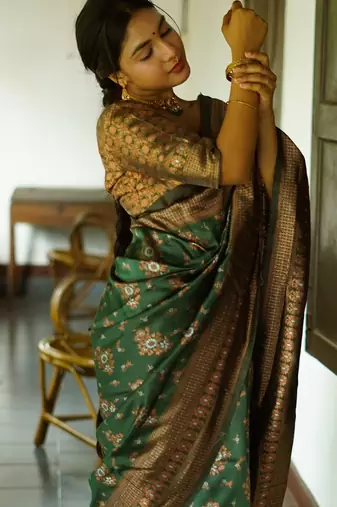green silk blend banarasi saree with unstitched blouse piece