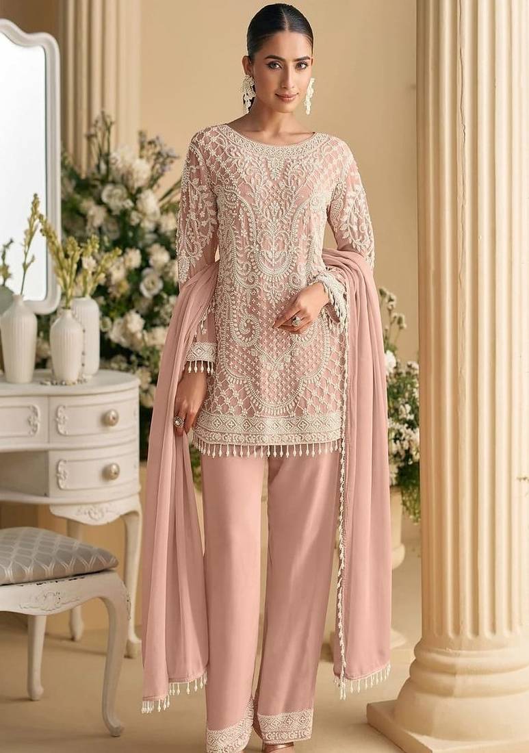 Baby pink palazzo set with beadwork and sequins.