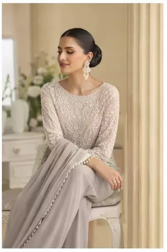 Mauve palazzo set with beadwork and sequins.