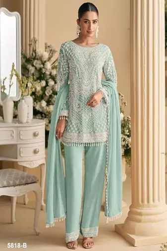 Light sea-green palazzo set with beadwork and sequins.