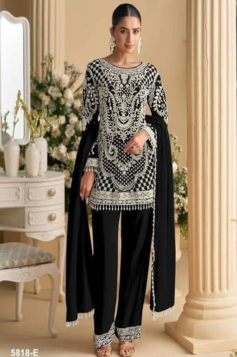 Black palazzo set with beadwork and sequins.