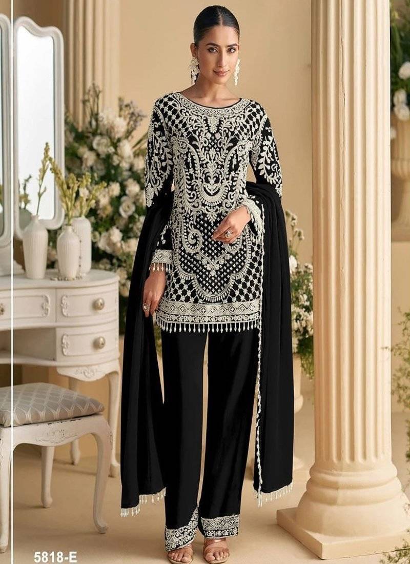 Black palazzo set with beadwork and sequins.
