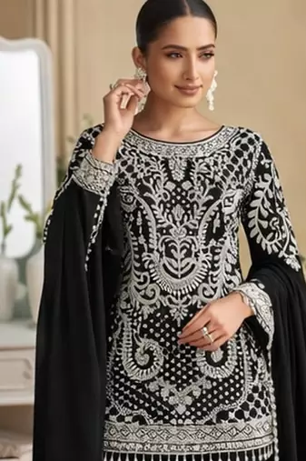 Black palazzo set with beadwork and sequins.