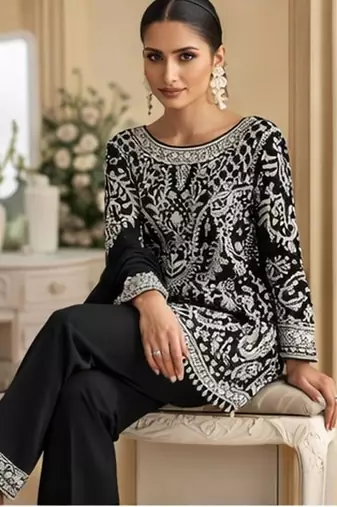 Black palazzo set with beadwork and sequins.