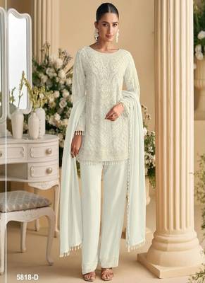 White palazzo set with beadwork and sequins. 1
