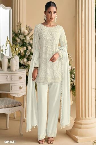 White palazzo set with beadwork and sequins.